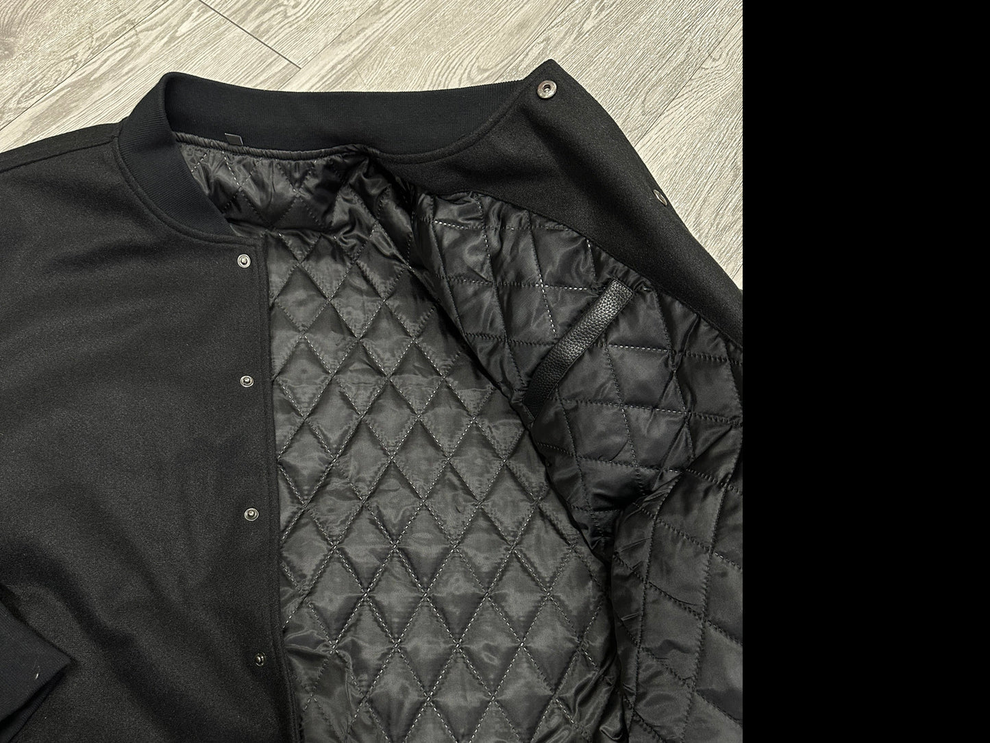 The Black Varsity Jacket